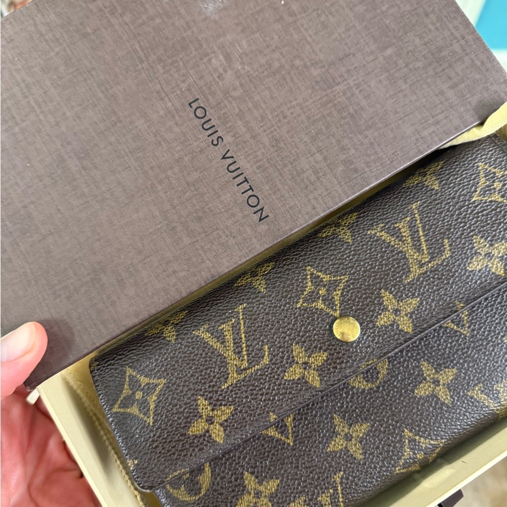 Louis Vuitton Brown Monogram Porte Tresor International Wallet for charity